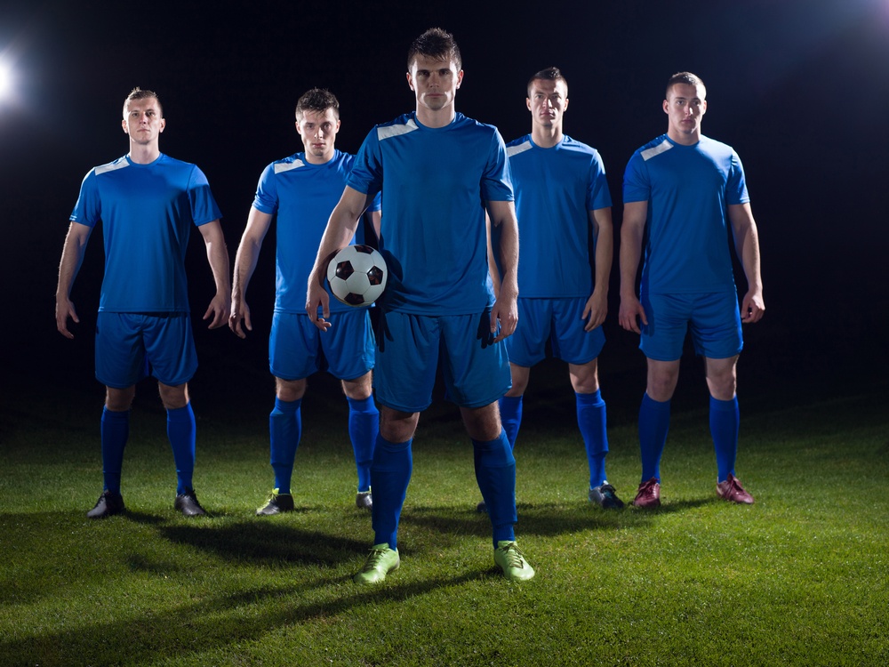 soccer players team group isolated on black background