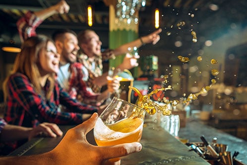 fans-at-bar-cheering